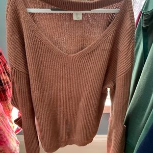Sweater with cut out sleeves